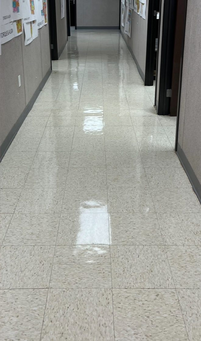 Corridor floor after strip and wax, high-gloss finish